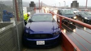 A DUI suspect drove 400 yards along the pedestrian walkway of the Golden Gate Bridge before becoming wedged in the fencing. ***photo via Golden Gate Bridge District***
