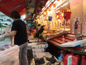 Mong Kok District - "busy corner" in Cantonese. One of the most densely populated places on Earth. 